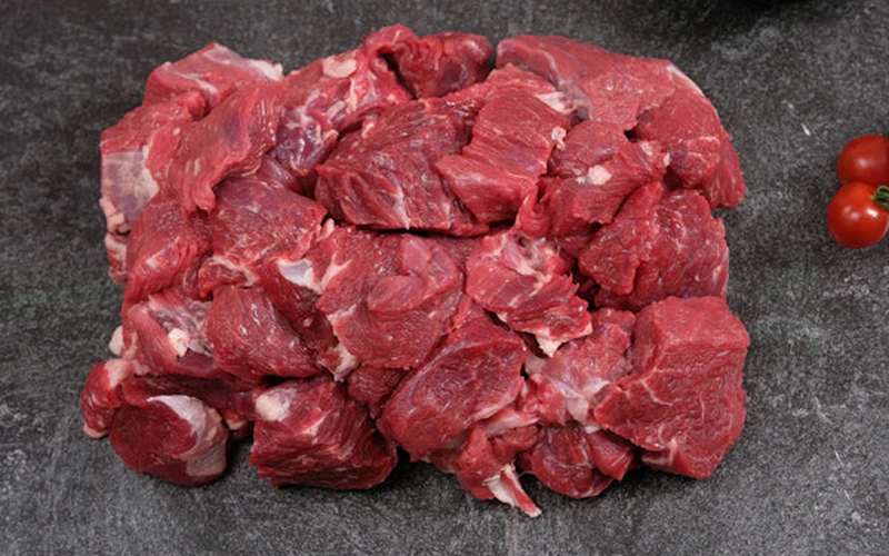 Raw cubed red meat